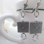 Metal and Pearls Dangle Ear..
