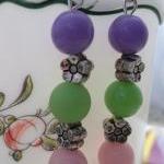 Purple, green, and Pink Bea..