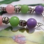 Purple, green, and Pink Bea..