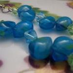 Turquoise glass beads and g..